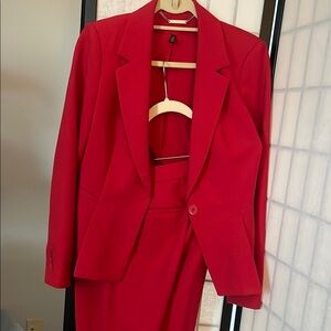 Red suit. White House Black Market. Size 4. Excellent condition.